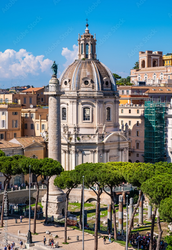 Most Holy Name of Mary at the Trajan Forum church with Column of Trajan at Foro Traiano and Piazza Venezia square in historic city center of Rome in Italy