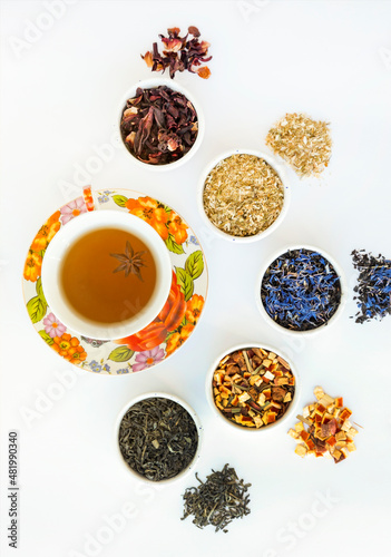 Natural herbal tea of different varieties. Variety of dry tea in utensils, close up.