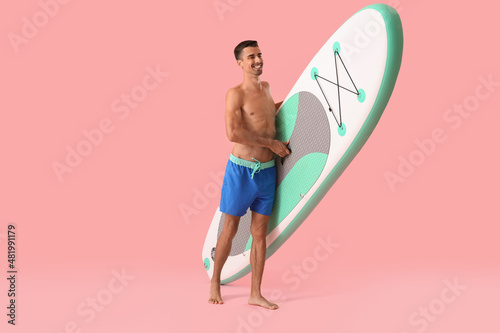 Handsome young man with boa...