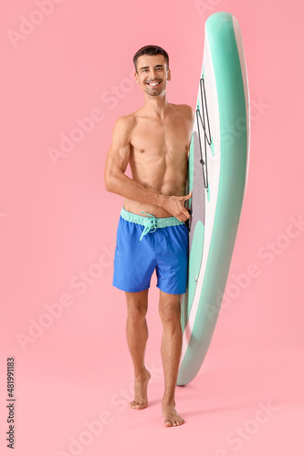 Handsome young man with boa...