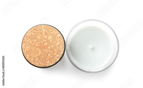 Scented wax candles on white background