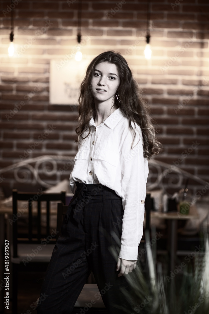 Portrait of a young beautiful long-haired girl. Vintage black and white photo. Portrait of a young beautiful long-haired girl. Vintage black and white photo.