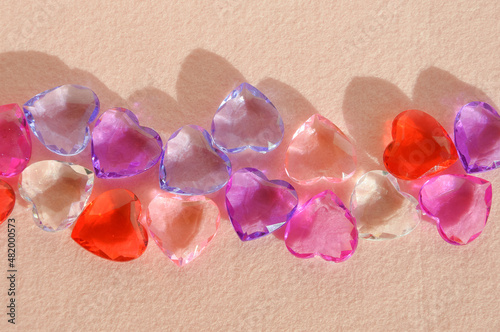 Happy Valentine's Day. background for the design of a romantic holiday. Love. Colorful stylish stone hearts.