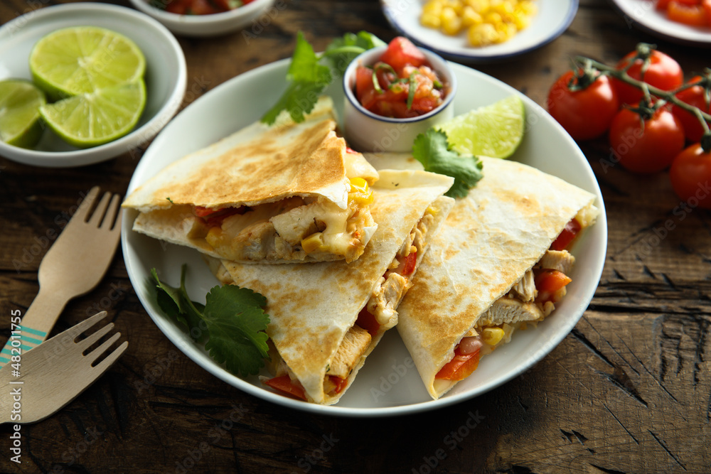 Homemade quesadilla with chicken and tomatoes Homemade quesadilla with chicken and tomatoes
