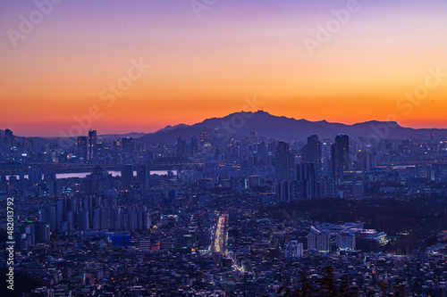 Cityscape night view of Seoul, South Korea at sunset time