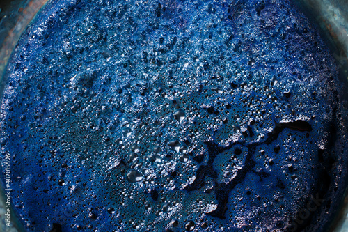  indigo color in clay pot for tie batik dyeing