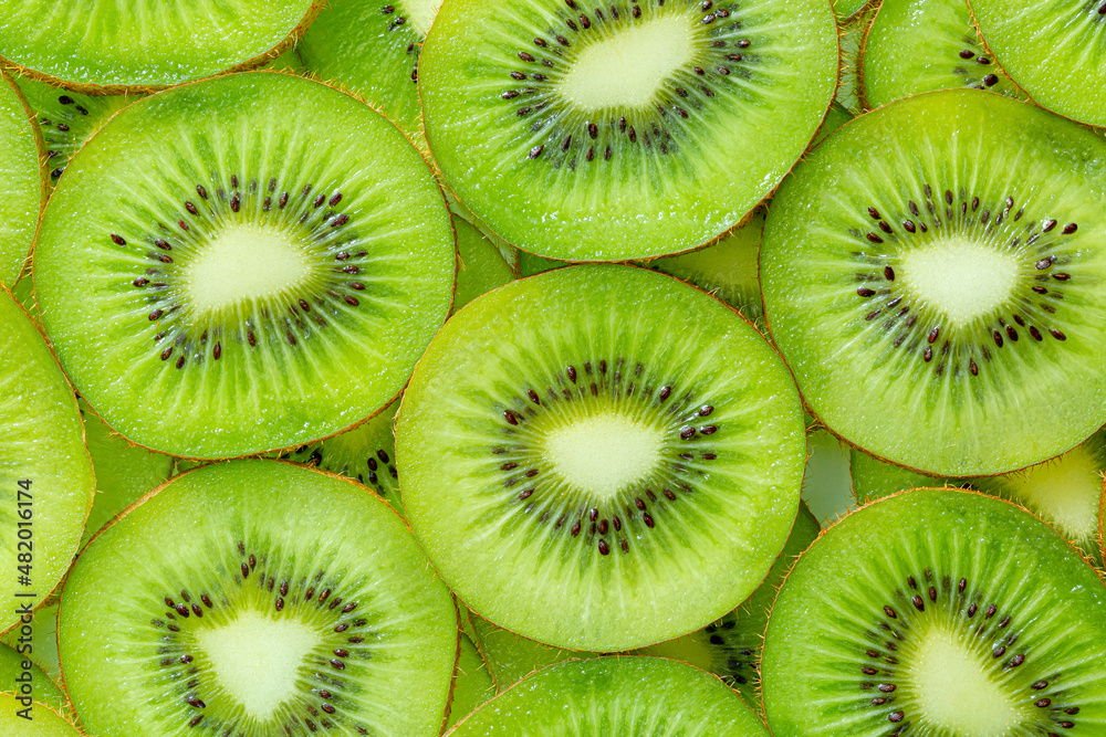 Kiwi Macro,Kiwi fruit pattern. Healthy food background, overhead. Kiwi Macro,Kiwi fruit pattern. Healthy food background, overhead.