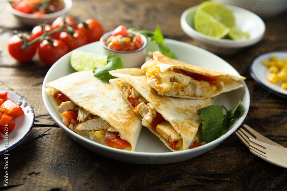 Homemade quesadilla with chicken and tomatoes Homemade quesadilla with chicken and tomatoes