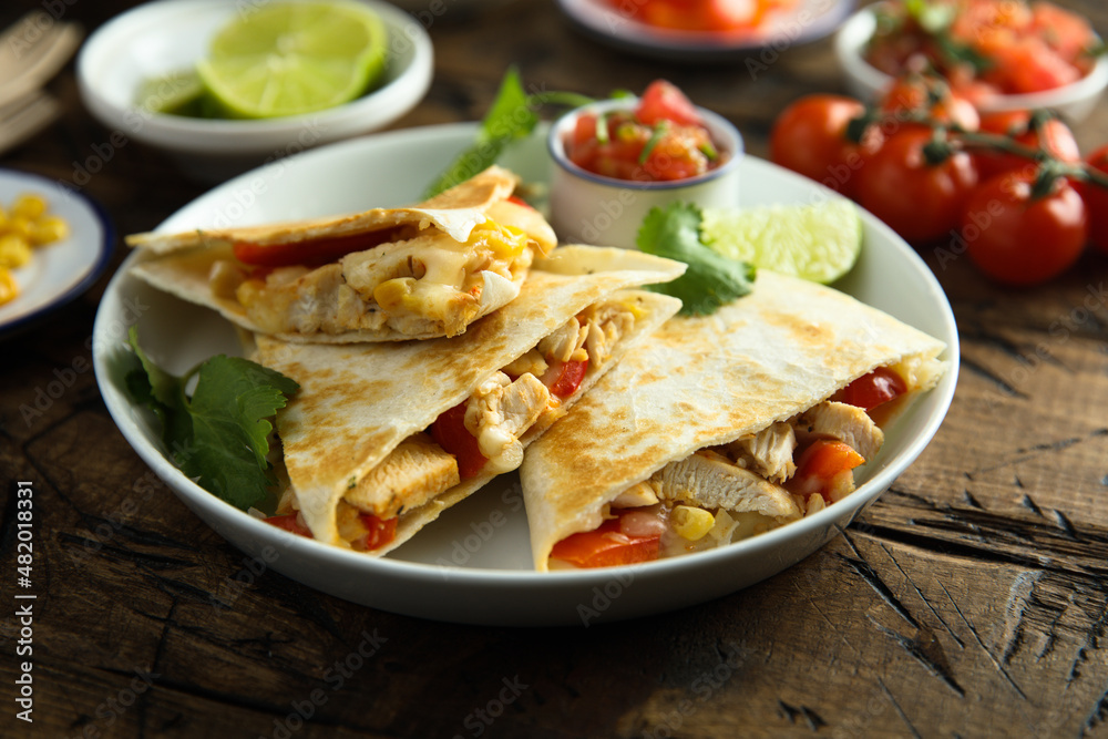 Homemade quesadilla with chicken and tomatoes Homemade quesadilla with chicken and tomatoes