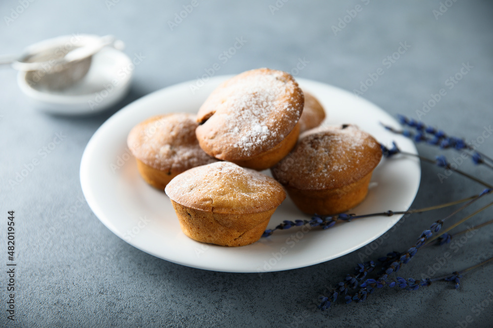 Homemade lavender muffins with icing sugar Homemade lavender muffins with icing sugar
