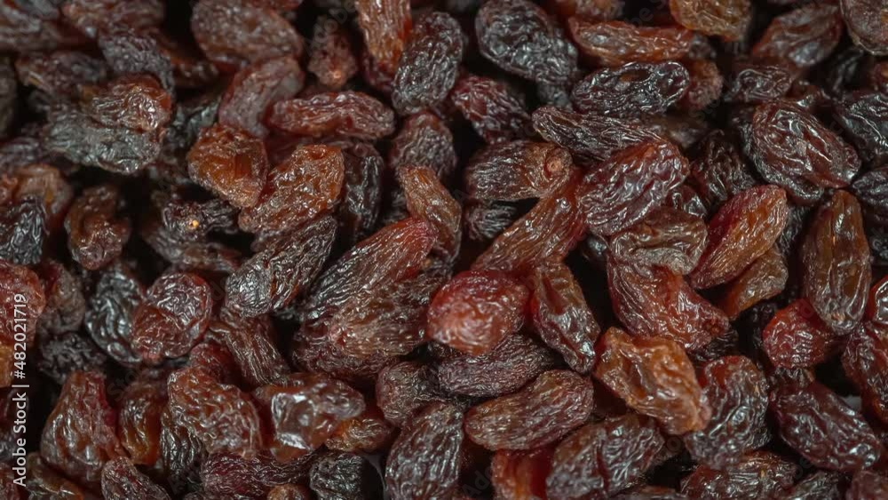 Many raisins at rotating background - looping video Many raisins at rotating background - looping video