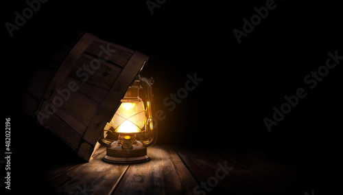 Lighted lamp under a bushel basket. Biblical parable theme concept. photo