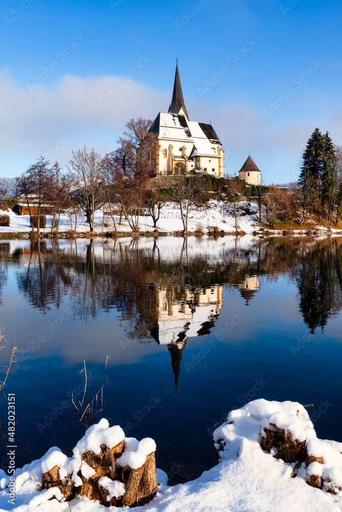Idyllic view of the pilgrimage church and in Maria Worth in winter, Carinthia, Austria