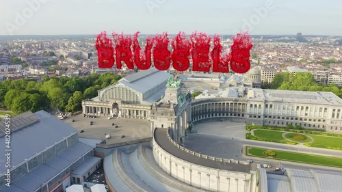 Inscription on video. Brussels, Belgium. Park of the Fiftieth Anniversary. Park Senkantoner. The Arc de Triomphe of Brussels (Brussels Gate). Flames with dark fire, Aerial View, Point of interest photo