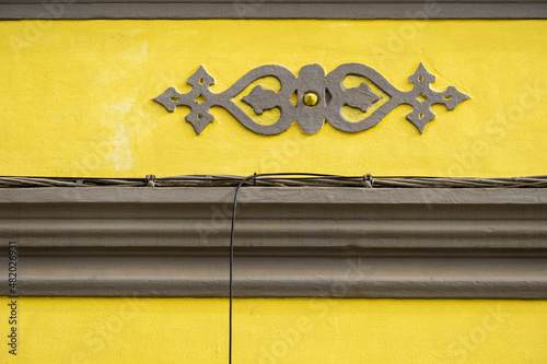 decorated pediment in the old town of Faro, Algarve, Portugal	