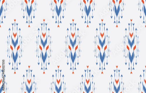 Ethnic abstract ikat pattern art. Seamless pattern in tribal, folk embroidery, and Mexican style. Aztec geometric art ornament print.Design for carpet, clothing, wrapping, fabric, cover, textile