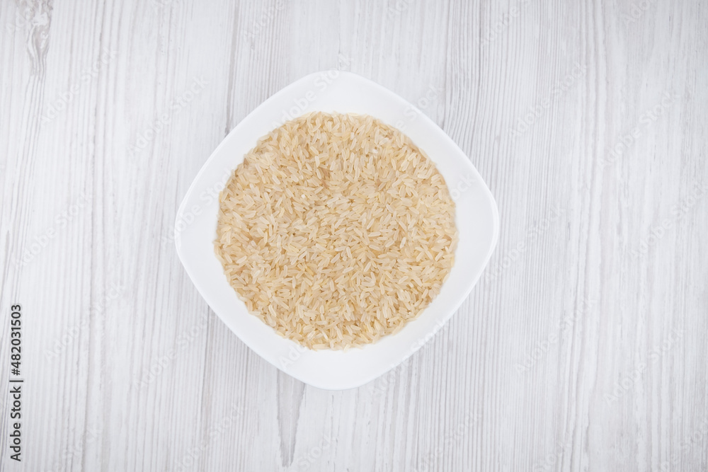 rice in a white plate on the table