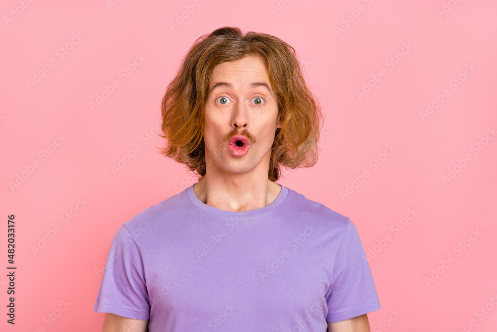 Portrait of attractive impressed red-haired guy sudden news reaction pout lips isolated over pink pastel color background Portrait of attractive impressed red-haired guy sudden news reaction pout lips isolated over pink pastel color background