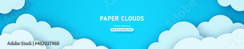 Beautiful fluffy clouds on blue sky background. Vector illustration. Paper cut style. Place for text. Summer day paperart long banner header. Spring morning cloudy concept