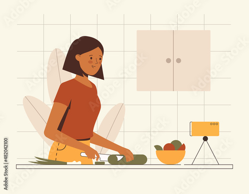Illustration of a young woman, girl, cooking, food blogger, in front of the camera in the kitchen. Flat vector design.