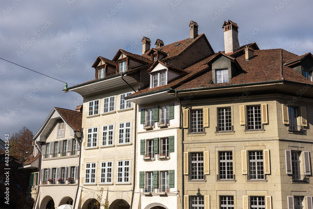 Fototapeta premium Sunlit facades of monumental buildings in the city of Bern, Switzerland