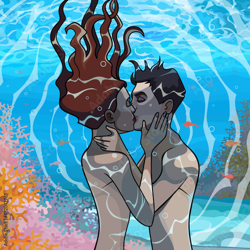 couple in love man and woman kiss underwater in the sea
