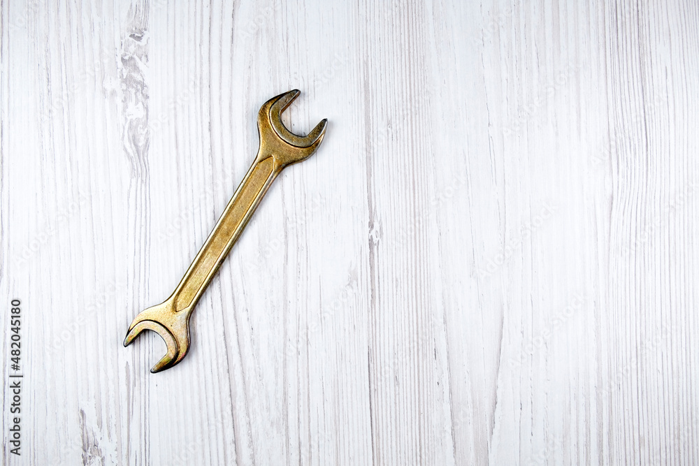 wrench on the table. Equipment repair. Car repair wrench on the table. Equipment repair. Car repair