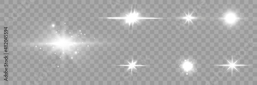 Collection of bright white light effects with rays and glare for vector illustration.