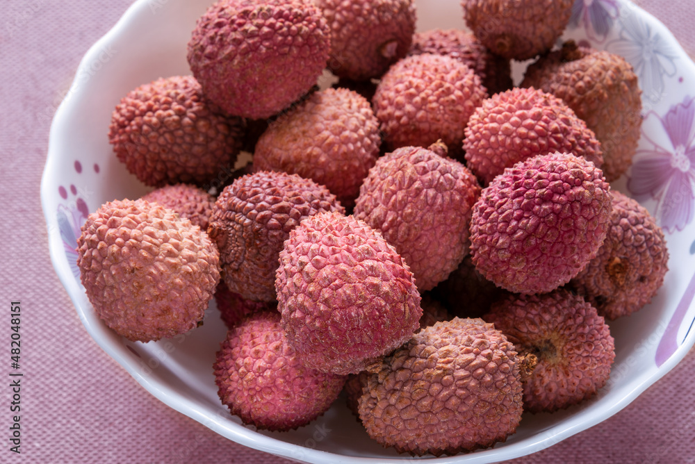 Lychee fruits or Chinese plum as natural food background.