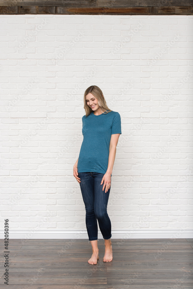 Heather Deep Teal Graphic T-shirt Bella Canvas 3001 Blank Mockup Tee Female Blonde Smiling Woman Model Heather Deep Teal Graphic T-shirt Bella Canvas 3001 Blank Mockup Tee Female Blonde Smiling Woman Model