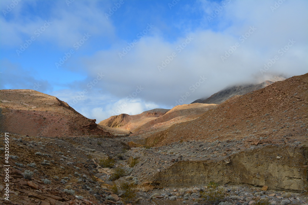blue sky and clouds on a sunny day in December in Death Valley National Park blue sky and clouds on a sunny day in December in Death Valley National Park