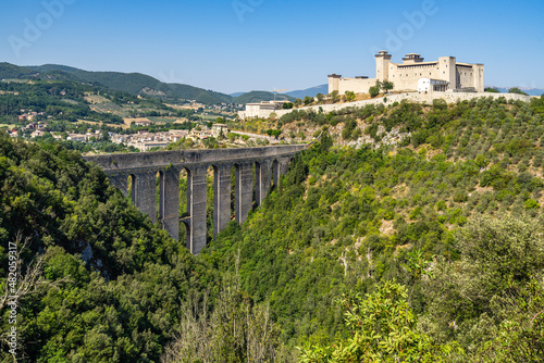 Scenic landscape near Spoleto with the bridge Ponte delle Torri and the Rocca Albornoziana fortress, Umbria, Italy photo