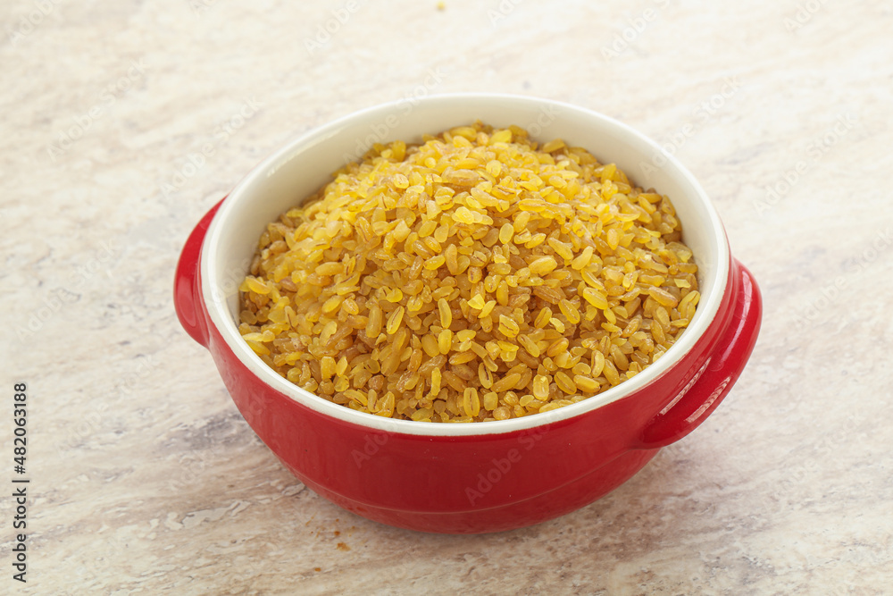 Raw bulgur in the bowl Raw bulgur in the bowl
