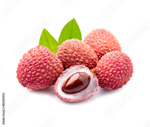 Lychee fruits with leaves closeup.