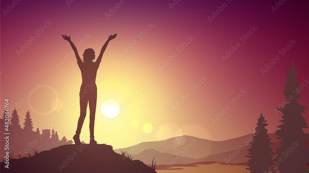 Silhouette of a woman with raised hands on the background of nature and sunset