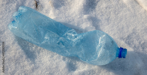 empty used plastic bottle as a symbol of environmental pollution