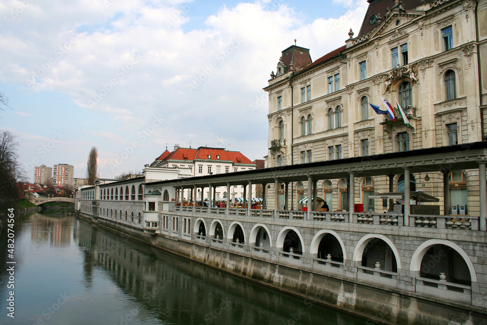 Traditional building and Ljubljanica River at old city center in Ljubljana, Slovenia. Ljubljana is the capital and largest city of Slovenia.