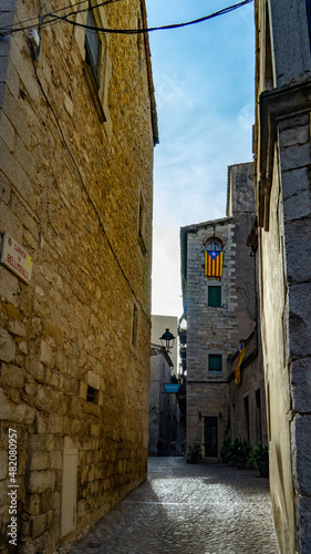 Streets of Girona with catalan flag