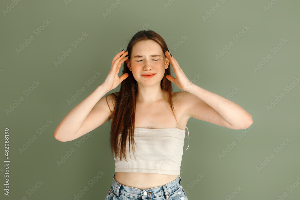 Portrait of young pretty upset, crying woman, having a a fight. Woman with closed eyes, hands near her face, nearly crying Portrait of young pretty upset, crying woman, having a a fight. Woman with closed eyes, hands near her face, nearly crying
