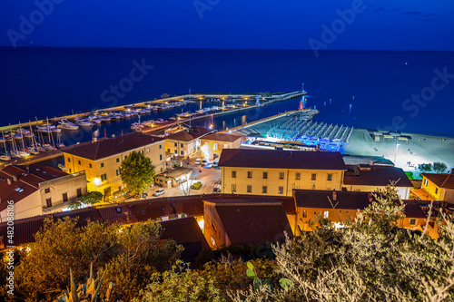 Night view of Castiglione della Pescaia photo