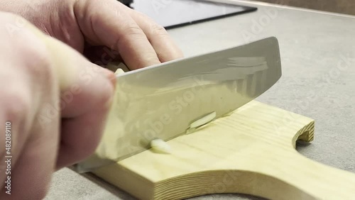 italian man cutting an onion