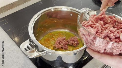 italian man cook bolognese meal