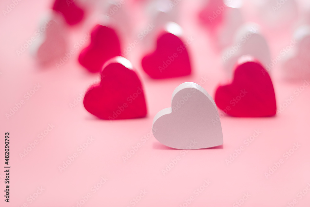Greeting card.Background of different colored wooden hearts.Template Valentine s day,romantic letterhead for cards, invitations,copy space. Lots of pink , white hearts on pink background.Love concept. Greeting card.Background of different colored wooden hearts.Template Valentine s day,romantic letterhead for cards, invitations,copy space. Lots of pink , white hearts on pink background.Love concept.