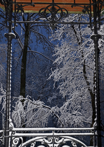 Winter gazebo view of tree branches covered with heaps of fresh snow at morning twilight