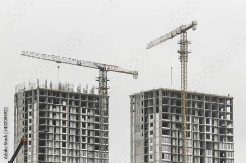 Tower crane, development of urban structures and construction of houses industry architecture