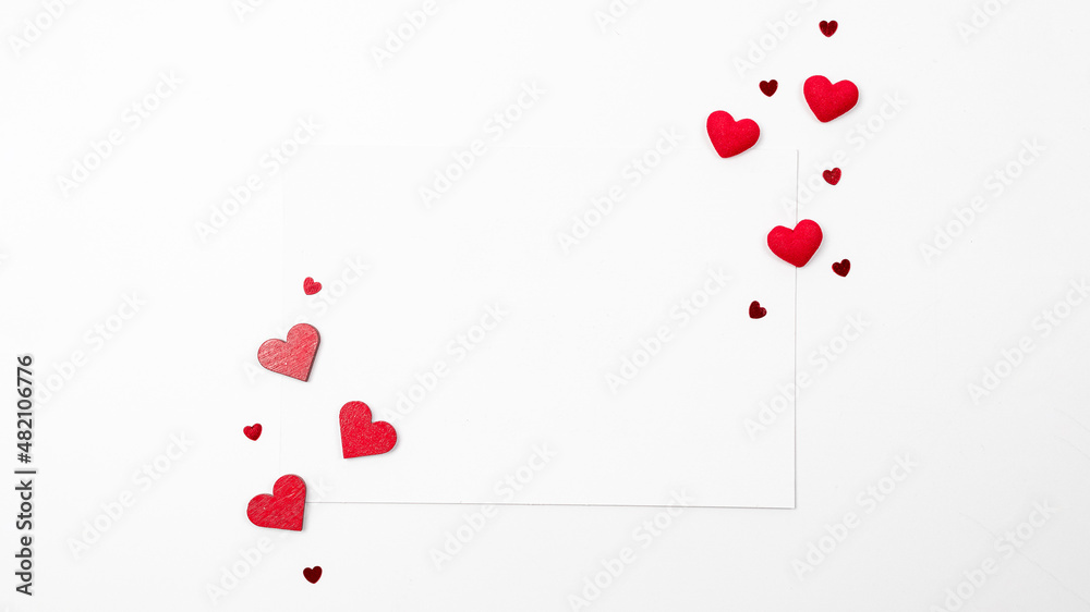 Valentine greeting card. Red heart, romantic gift on love white background. Valentines day decoration for flat lay card with copy space.