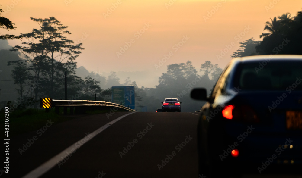 Travel in the morning on the expressway, view from behind the car. Travel in the morning on the expressway, view from behind the car.