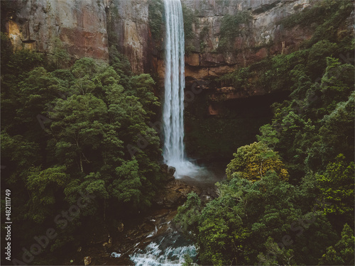 Aerial shot of a waterfall in a valley  Belmore Falls  New South Wales Austalia 