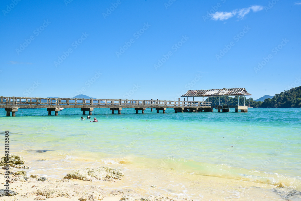 Naklejka premium Langkawi Island, Kedah, MalayLandscape view of bridge and jetty in seaside with beautiful nature view.