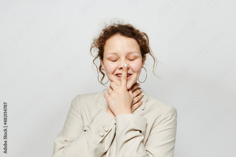 beautiful woman classic suit fashion posing fun light background unaltered beautiful woman classic suit fashion posing fun light background unaltered